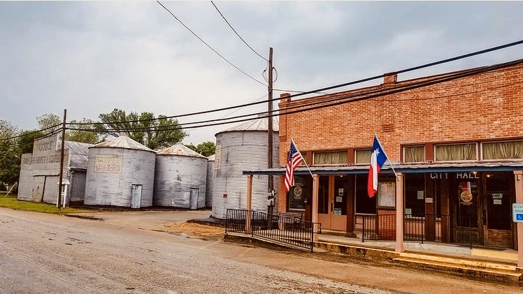 City Hall with silos in background