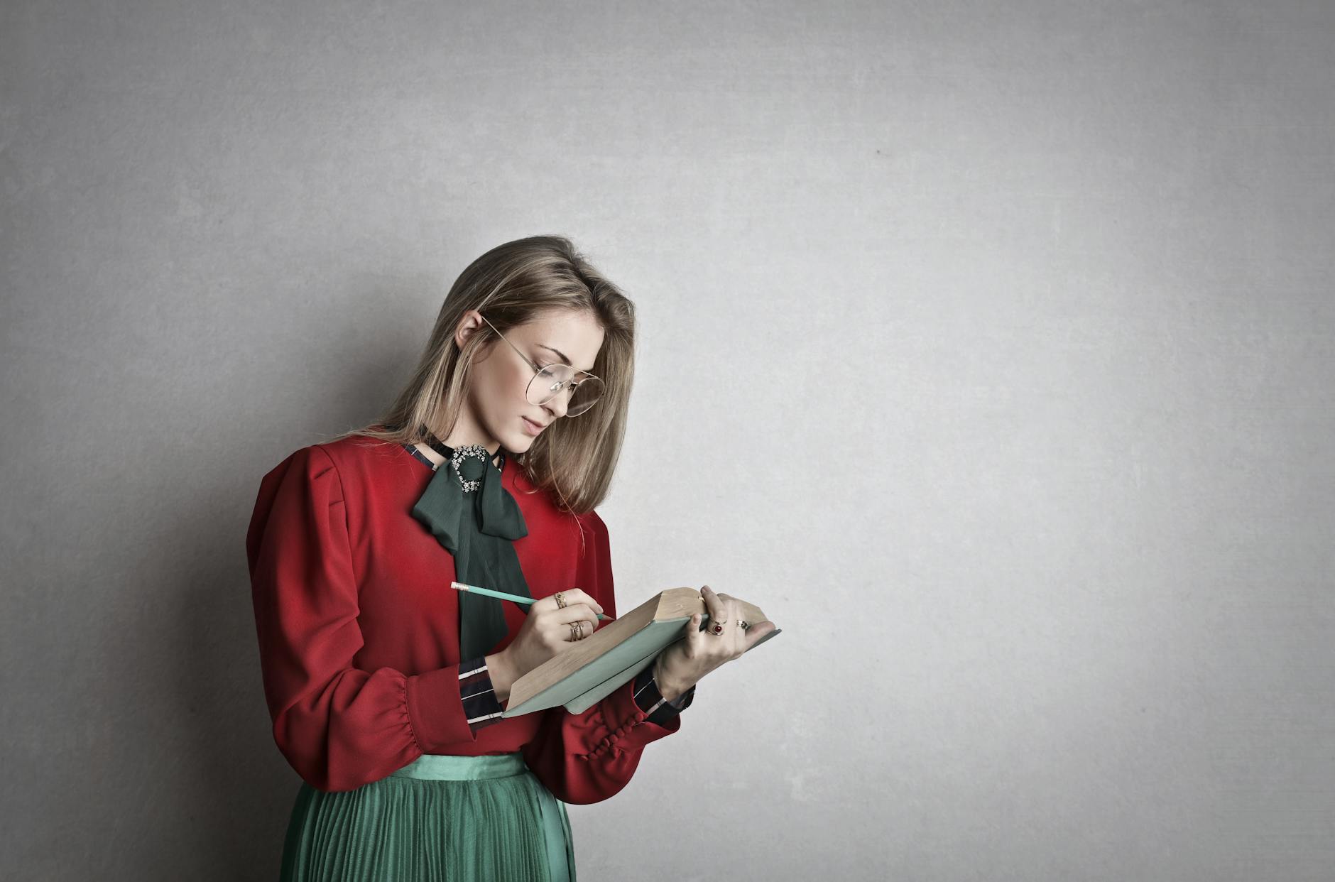 smart adult female student reading book in studio

Photo by Andrea Piacquadio on Pexels.com